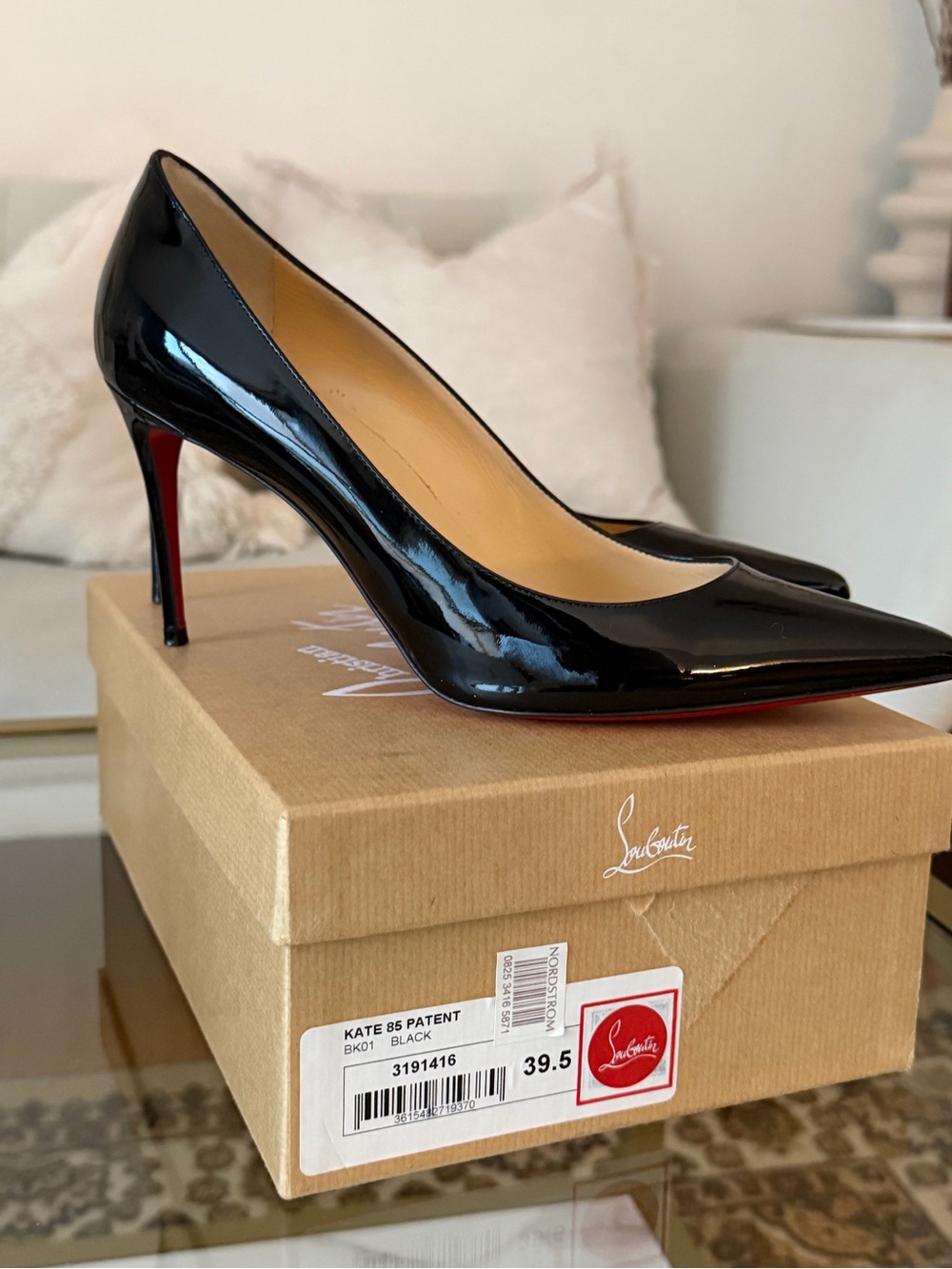 Christian Louboutin Black Patent Pointed-Toe Pumps with Red Sole